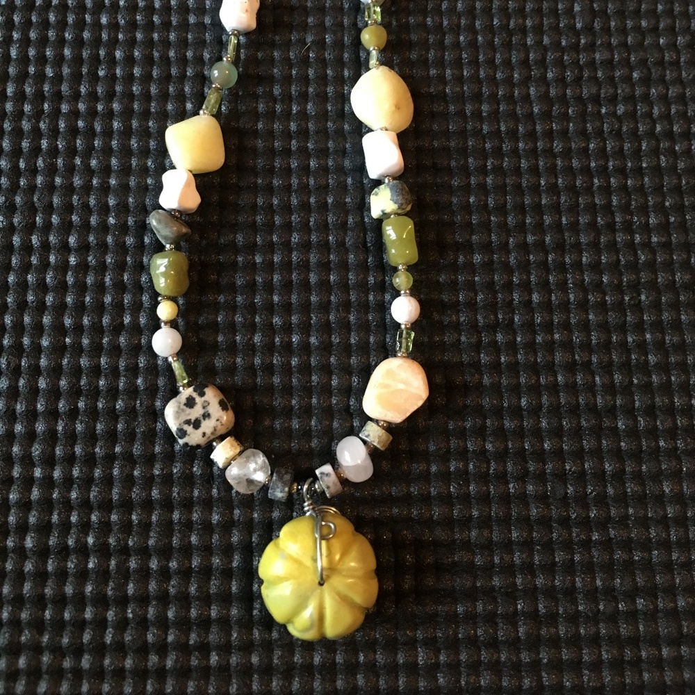 Green and white beaded necklace